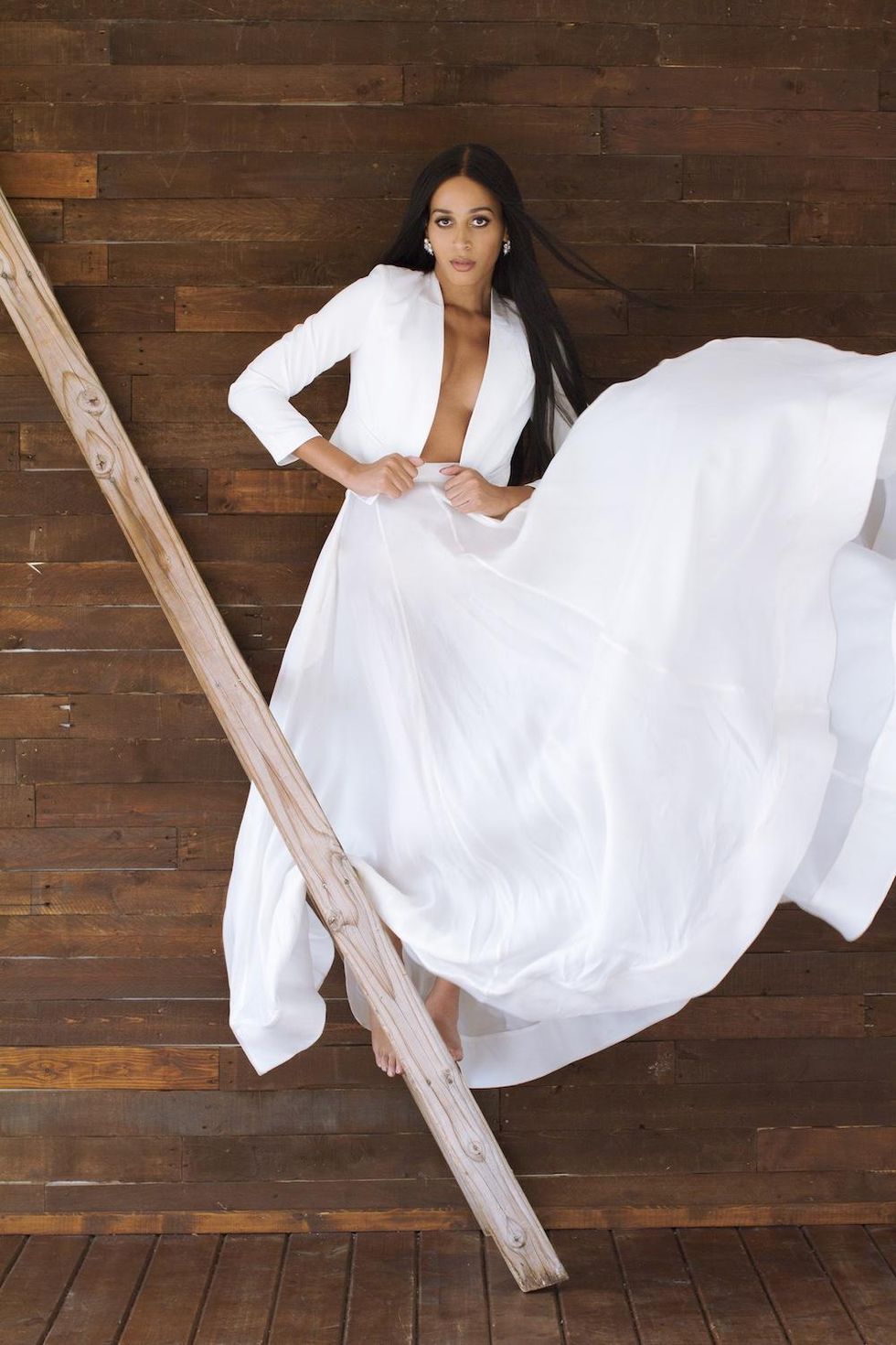 Isis King in French Mauve white blazer, Quin white skirt.