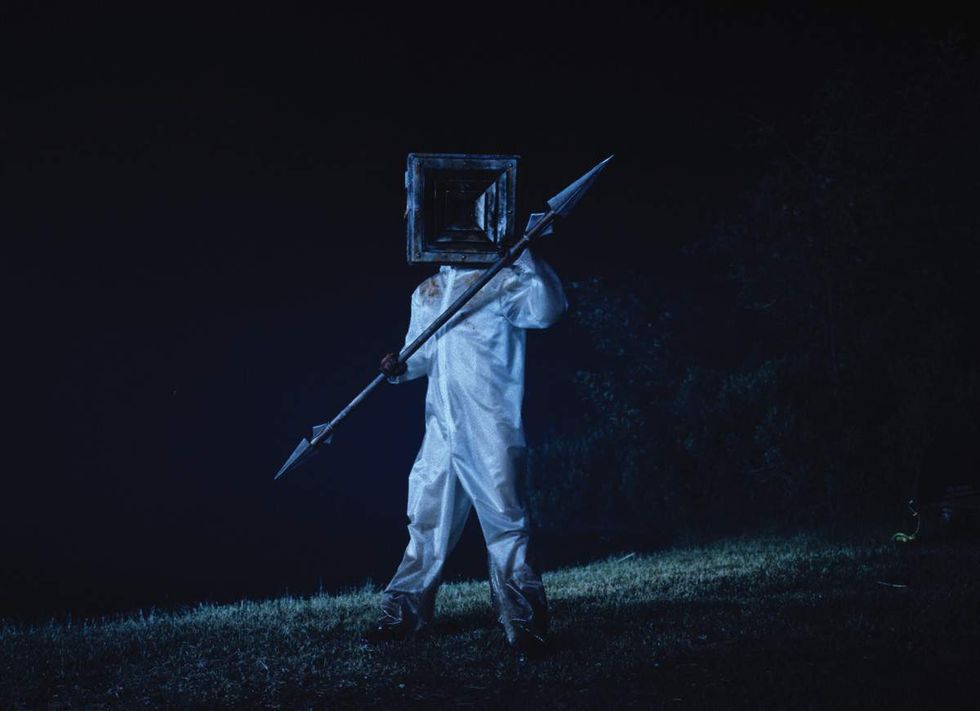 Jack Haven's character Little Death holds a double-ended spear in a scene from Teenage Sex and Death at Camp Miasma
