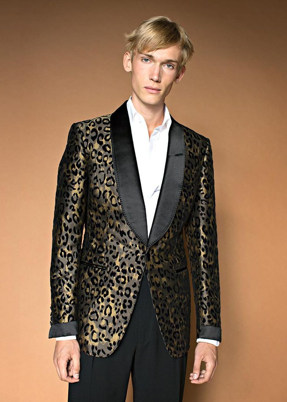 Jacket, $4,990, shirt, $1,125, and pants, $1,420, by Tom Ford