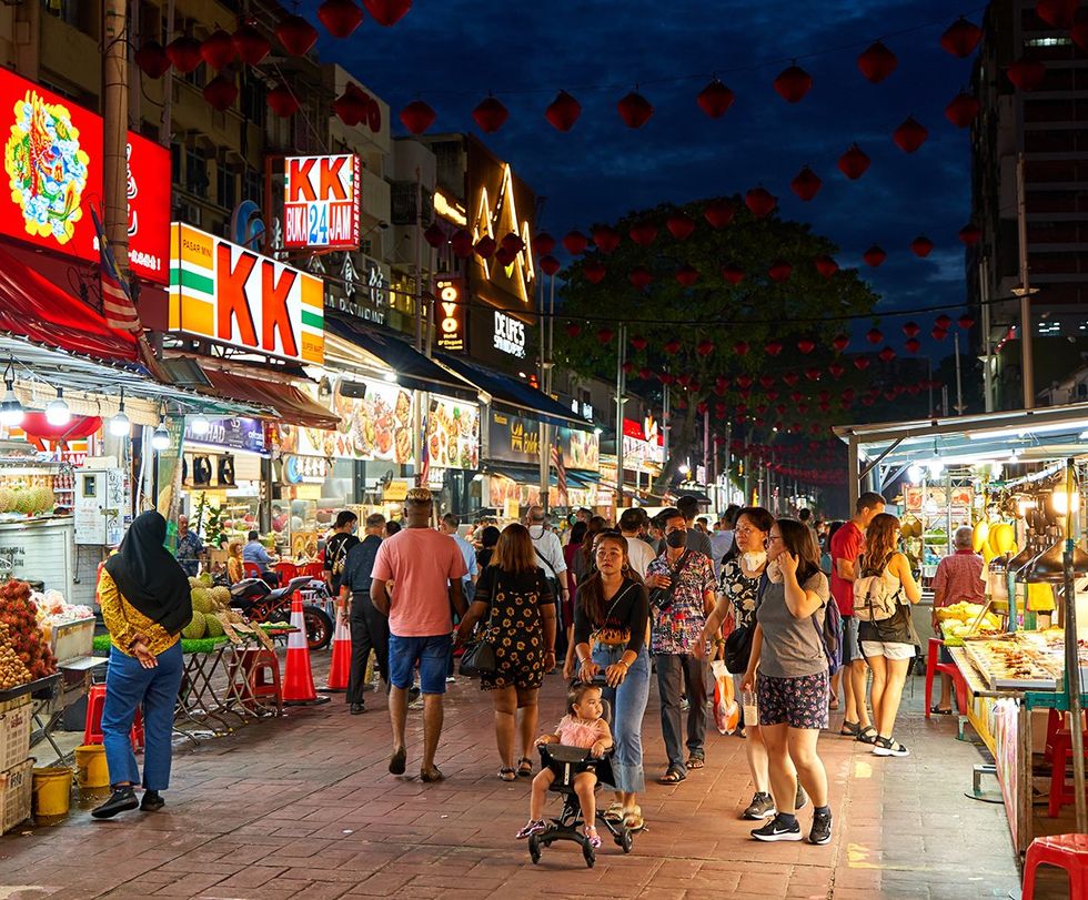 Jalan Alor night food market in Bukit Bitang popular lively crowded tourist food street Kuala Lumpur, Malaysia