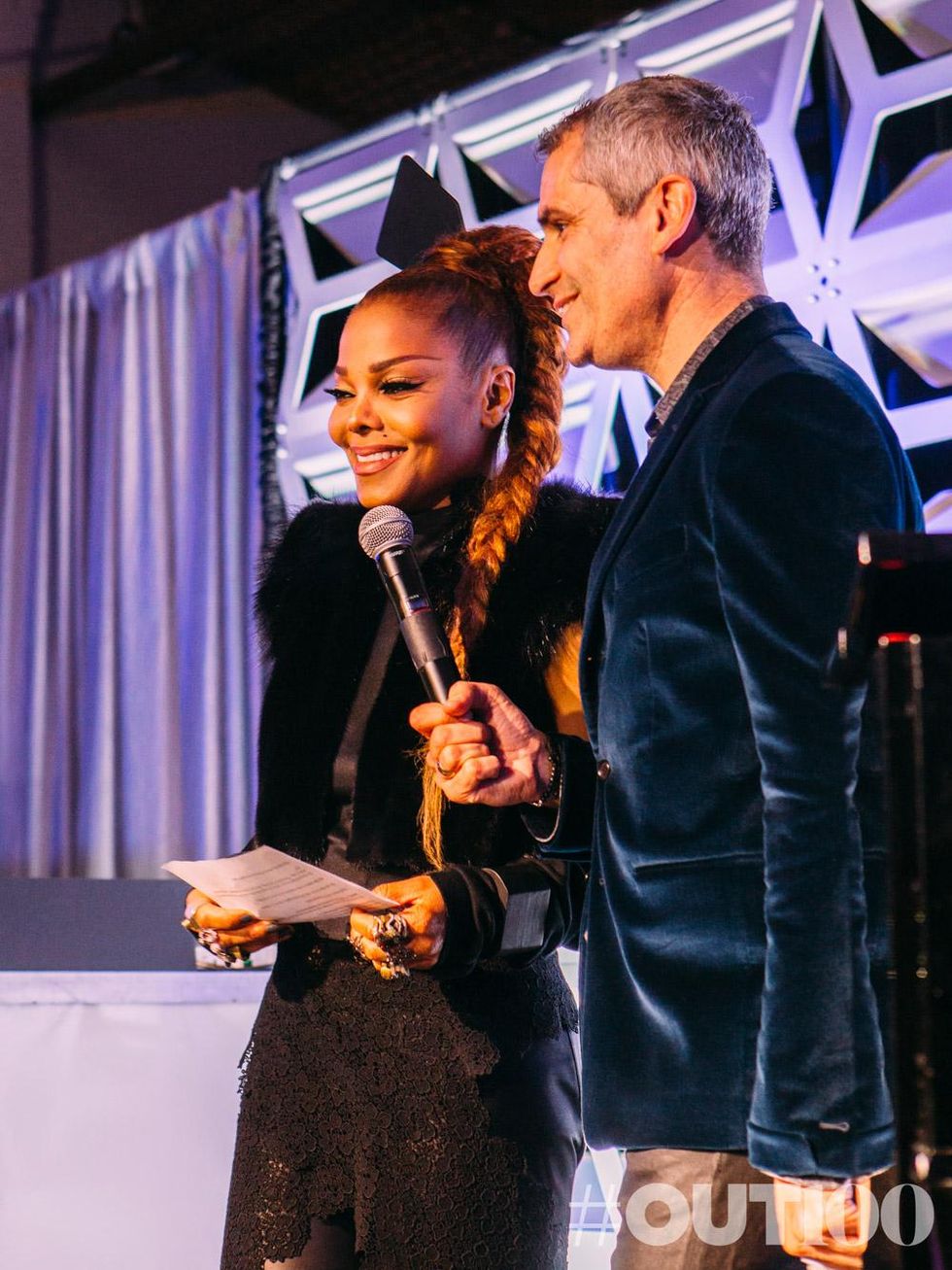 Janet Jackson accepts The OUT Gilead Sciences Music Icon Award with OUT Editor In Chief Aaron Hicklin
