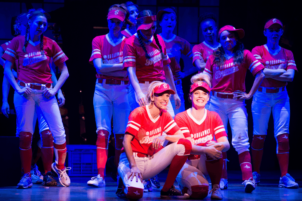 Jenn Colella poses with members of the Broadway Beavers softball team.