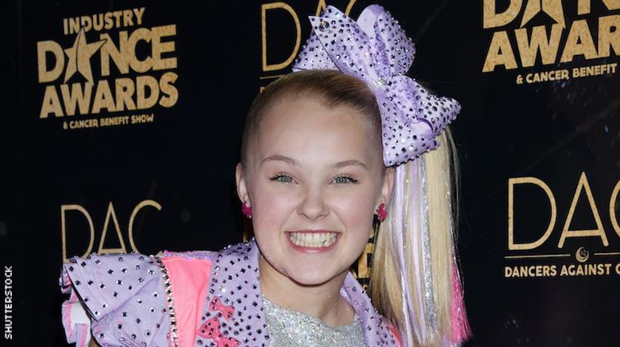 Jojo Siwa on a red carpet.