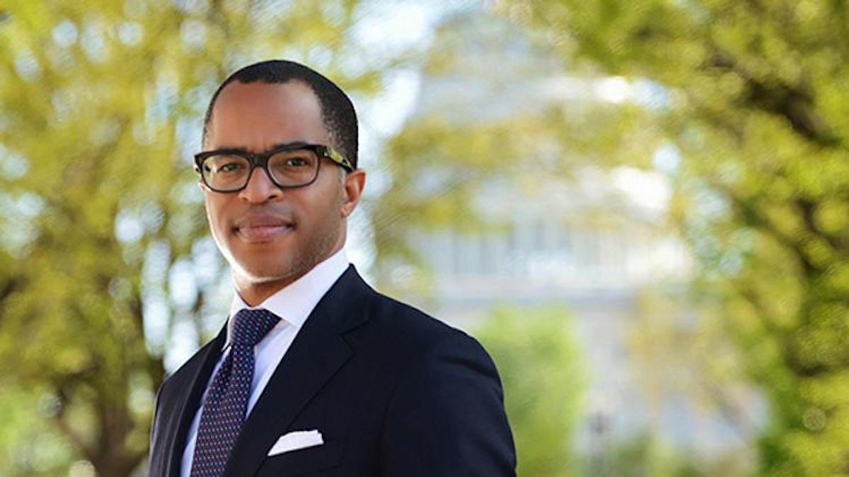 Jonathan Capehart in a suit.