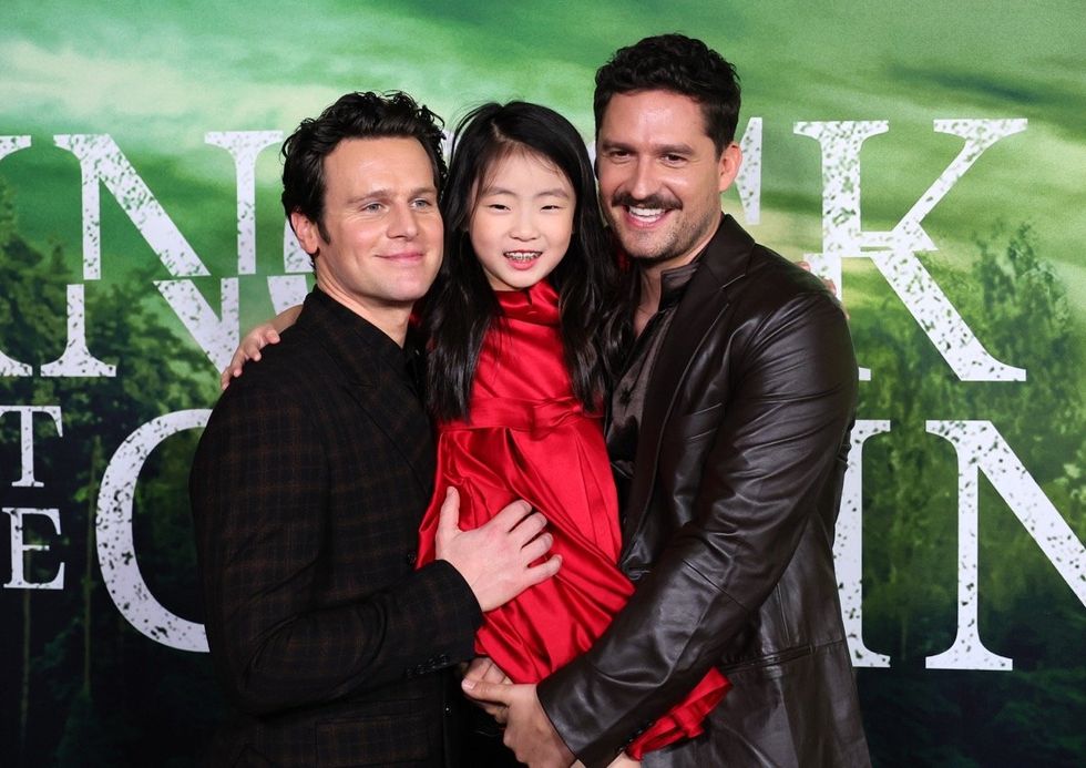 Jonathan Groff, Kristen Cui, and Ben Aldridge attending the world premiere of 'Knock at the Cabin' (2023)