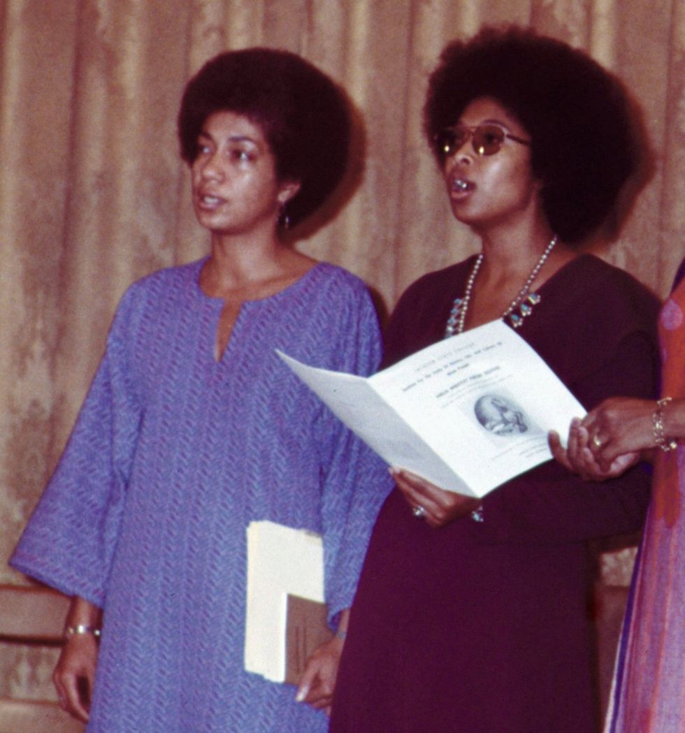 June Jordan next to Alice Walker