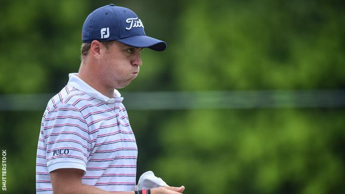 Justin Thomas looking disappointed wearing Ralph Lauren Polo