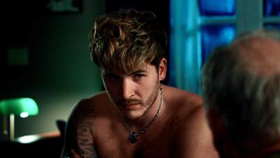 Kieron Moore in Blue Film.