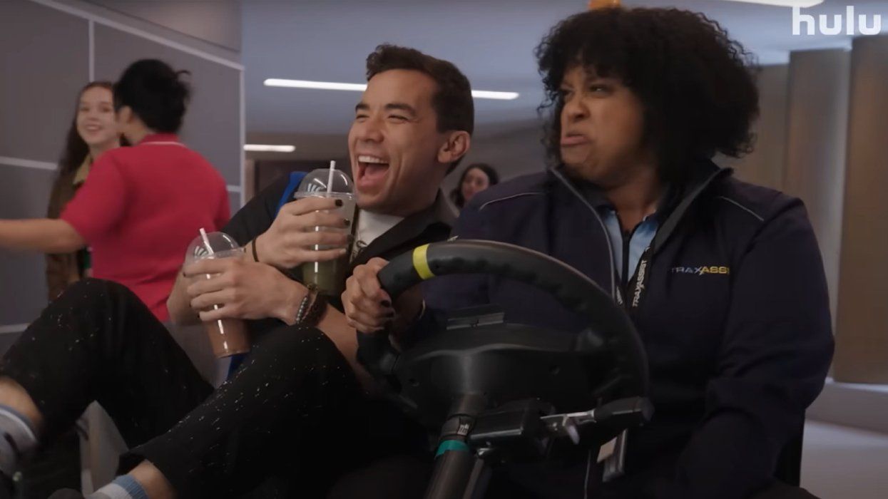 L to R: Conrad Ricamora and Natasha Rothwell star in Hulu's 'How to Die Alone.'