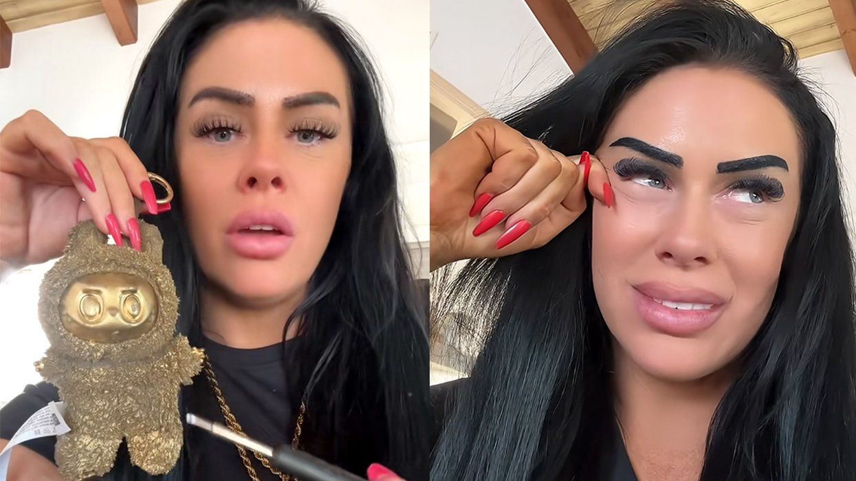 Labubu 24k gold doll held by tiktok lilzbullzofficial