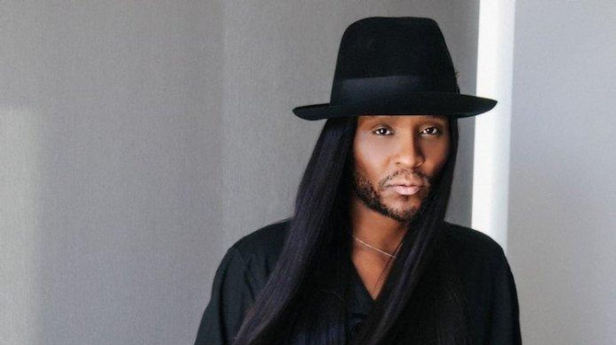 Law roach wearing a hat.