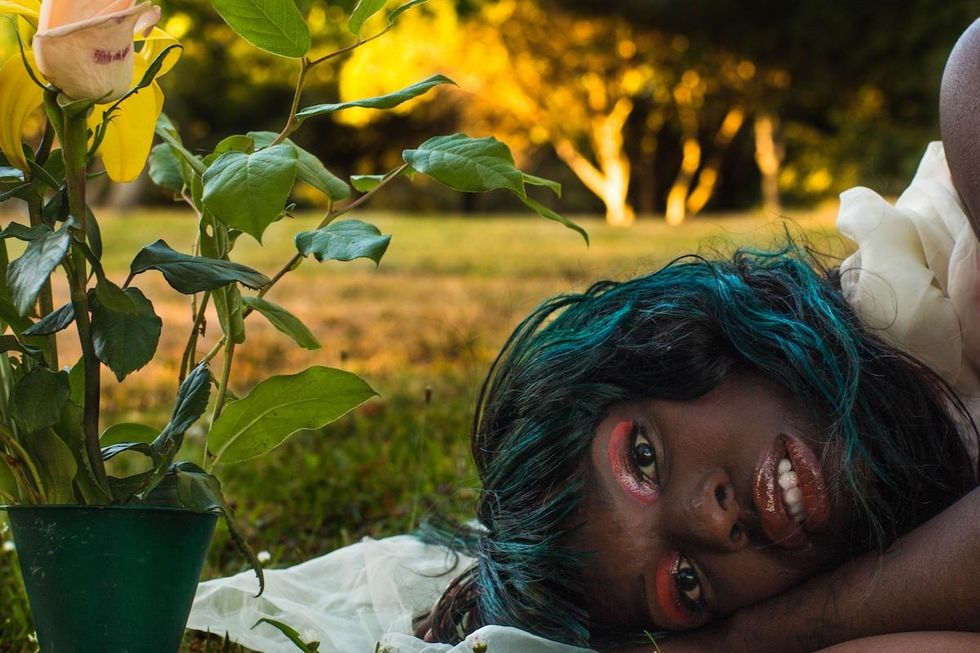 Laying_by_the_flowers