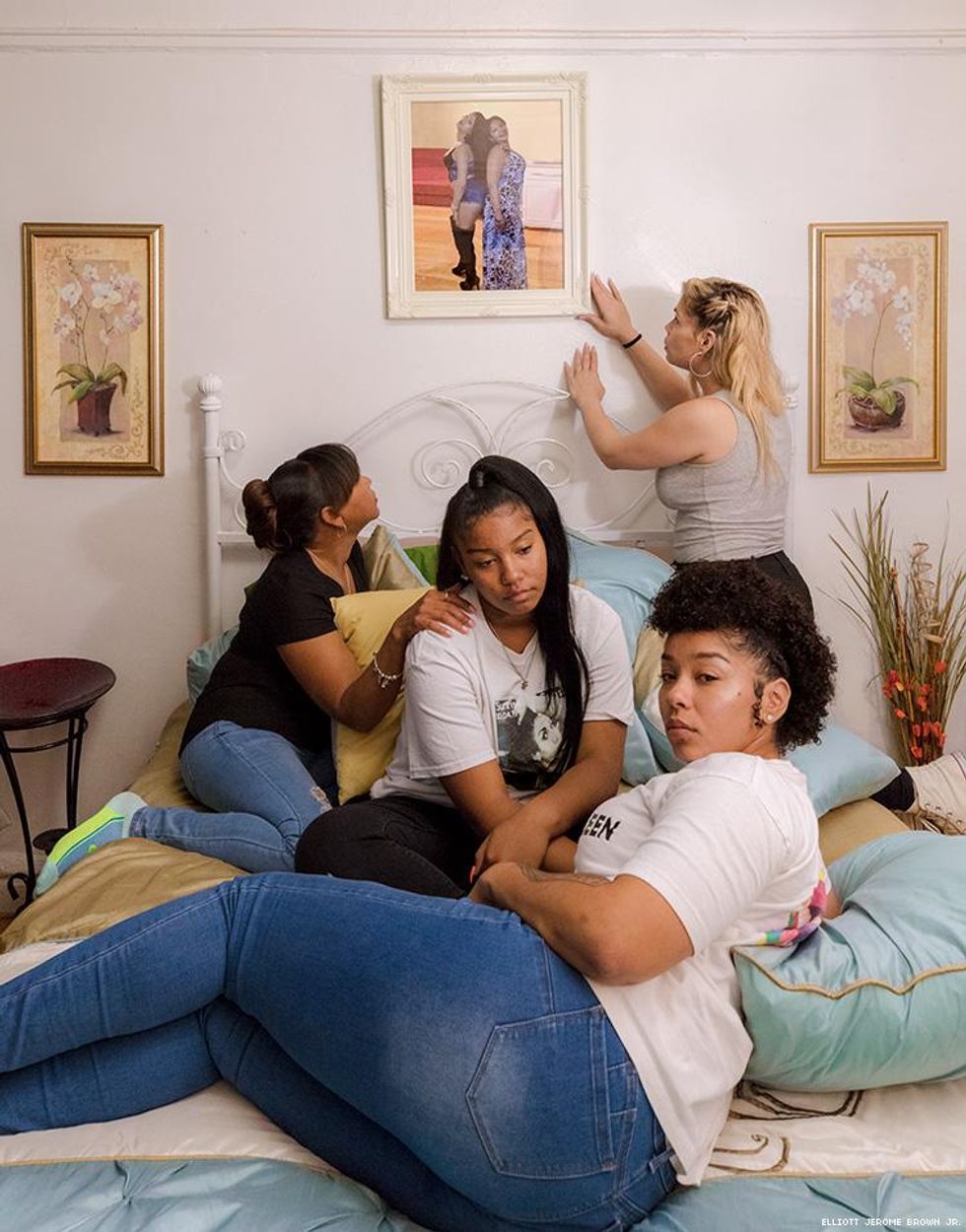 Layleen Polanco's family on her bed.