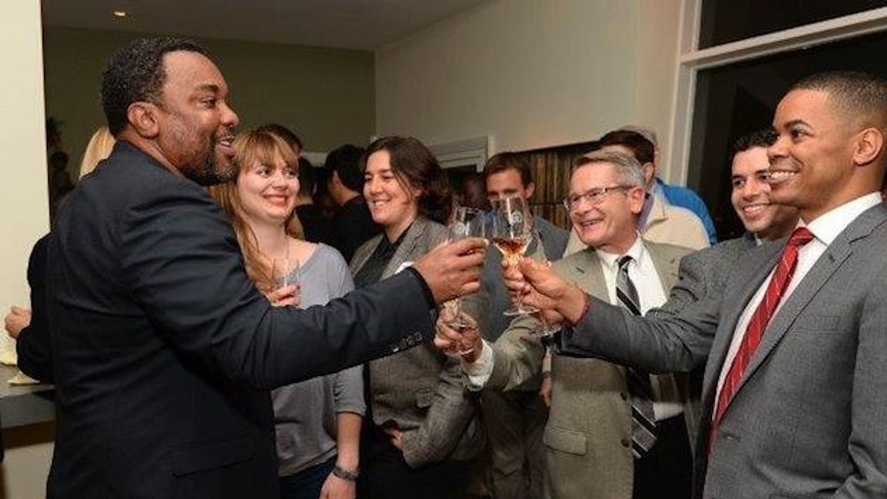 Lee%20daniels%20toasting%20with%20guests