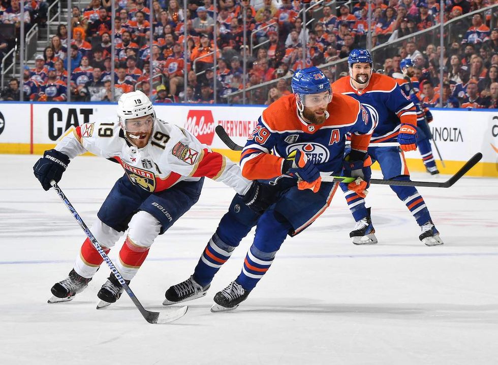 Leon Draisaitl #29 of the Edmonton Oilers skates against Matthew Tkachuk #19 of the Florida Panthers in Game Three of the 2024 Stanley Cup Final