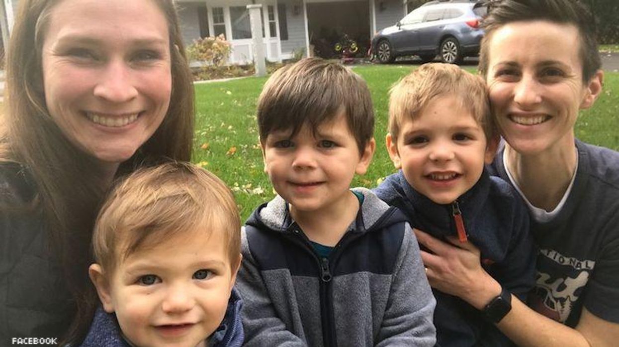 Lesbian parents and their three sons.