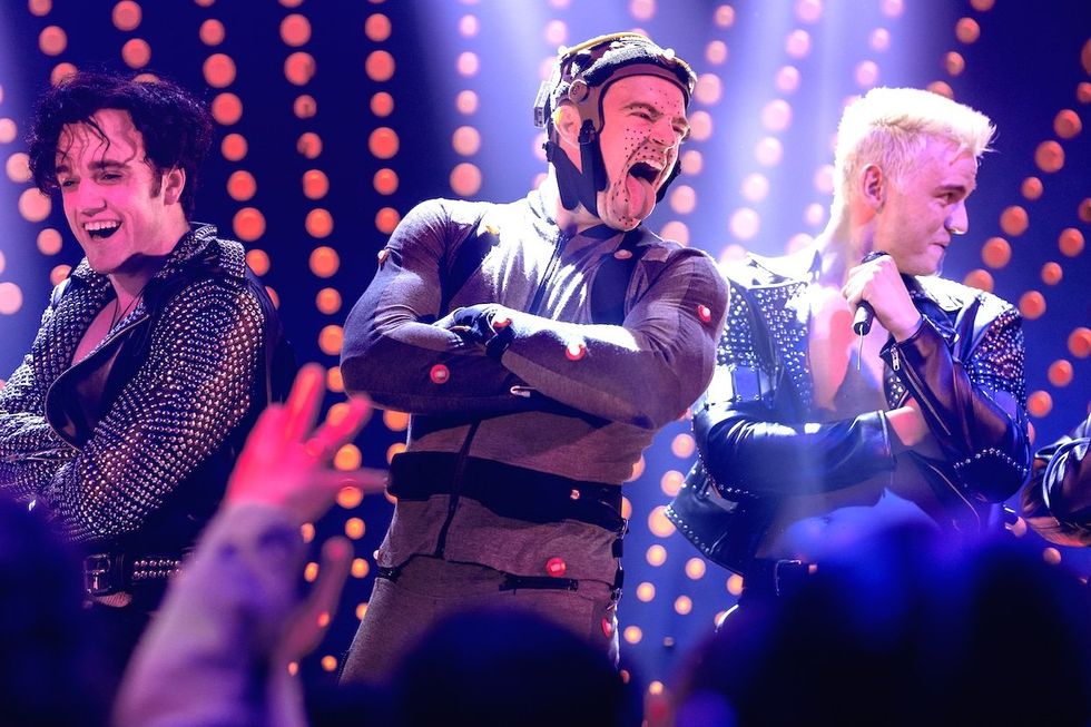 Liam Head as Howard Donald, Jonno Davies as Robbie Williams, and Jake Simmance as Gary Barlow in Better Man