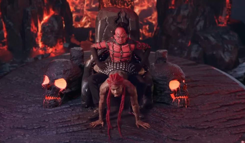 Lil Nas X giving a lap dance to the devil