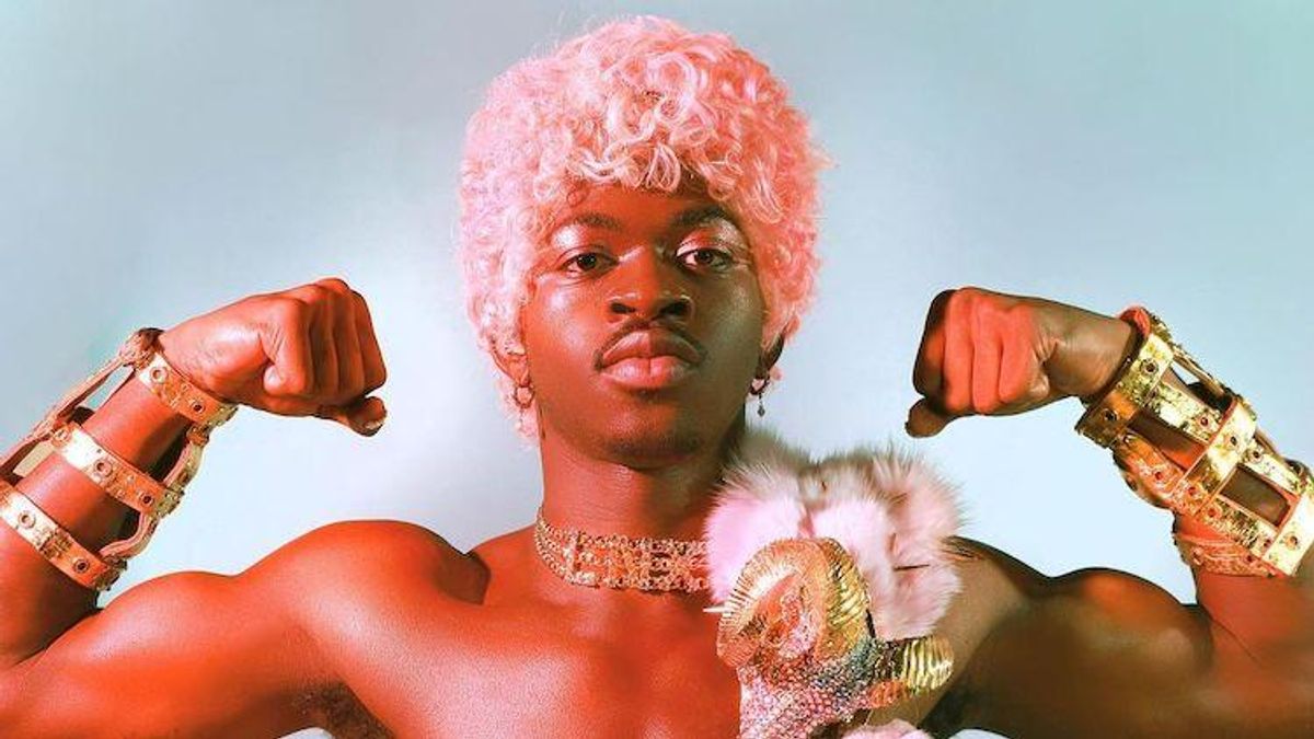 Lil Nas X in a pink wig.