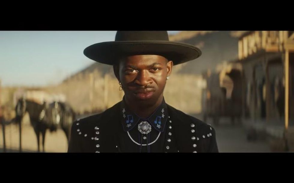 Lil Nas X in cowboy gear.