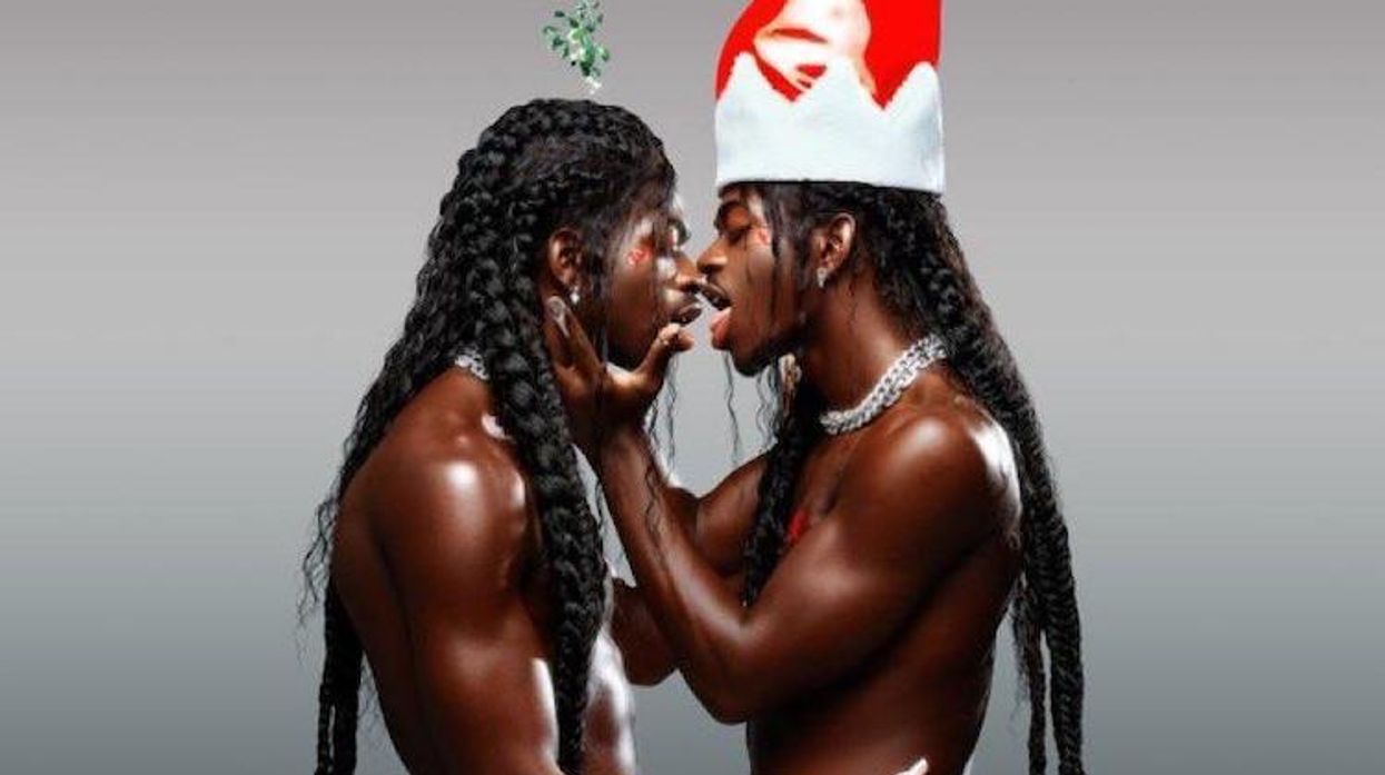 Lil Nas X kissing himself in Holiday promo