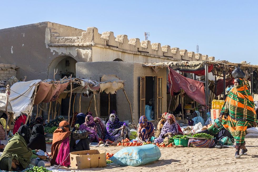 Local people buying and selling in street market, Faya, Chad