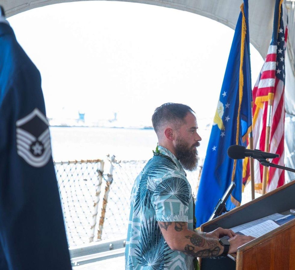 logan ireland on the uss missouri speaking at a retirement ceremony