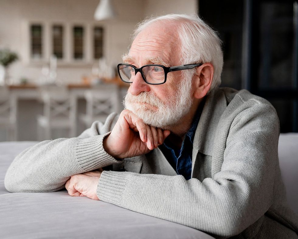 Loneliness epidemic threatens LGBTQ+ community; old gay man alone at home