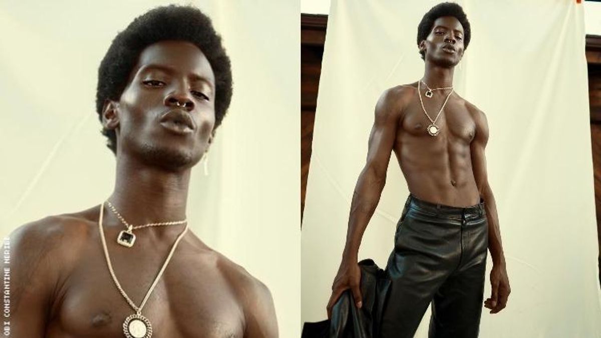 Male model Adonis Bosso shirtless.