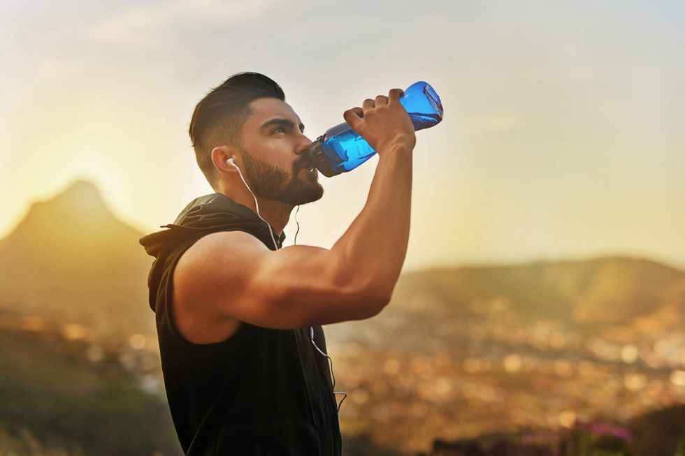 Man drinking from a water bottle