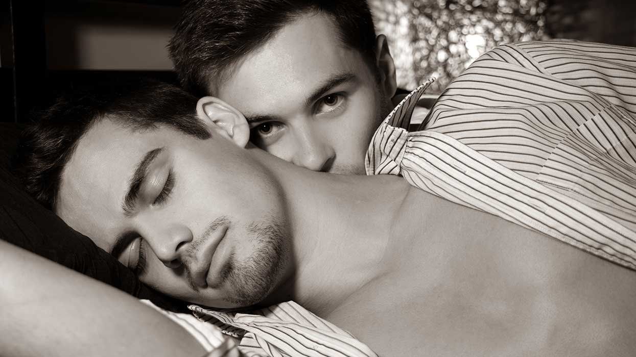 man in bed with husband