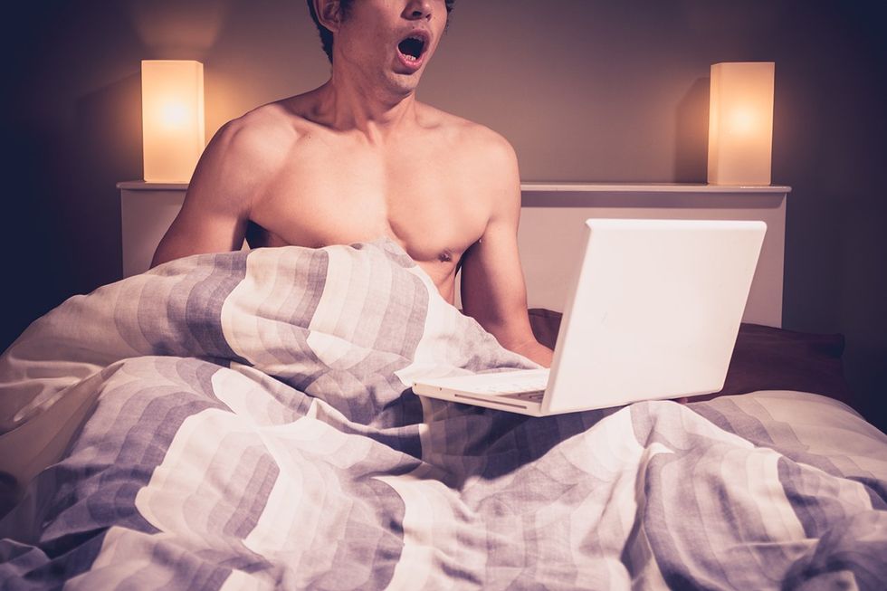 man watching porn and masturbating