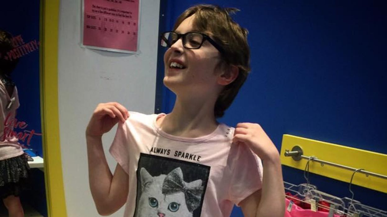 Martie Sirois's son posing in his feminine clothing