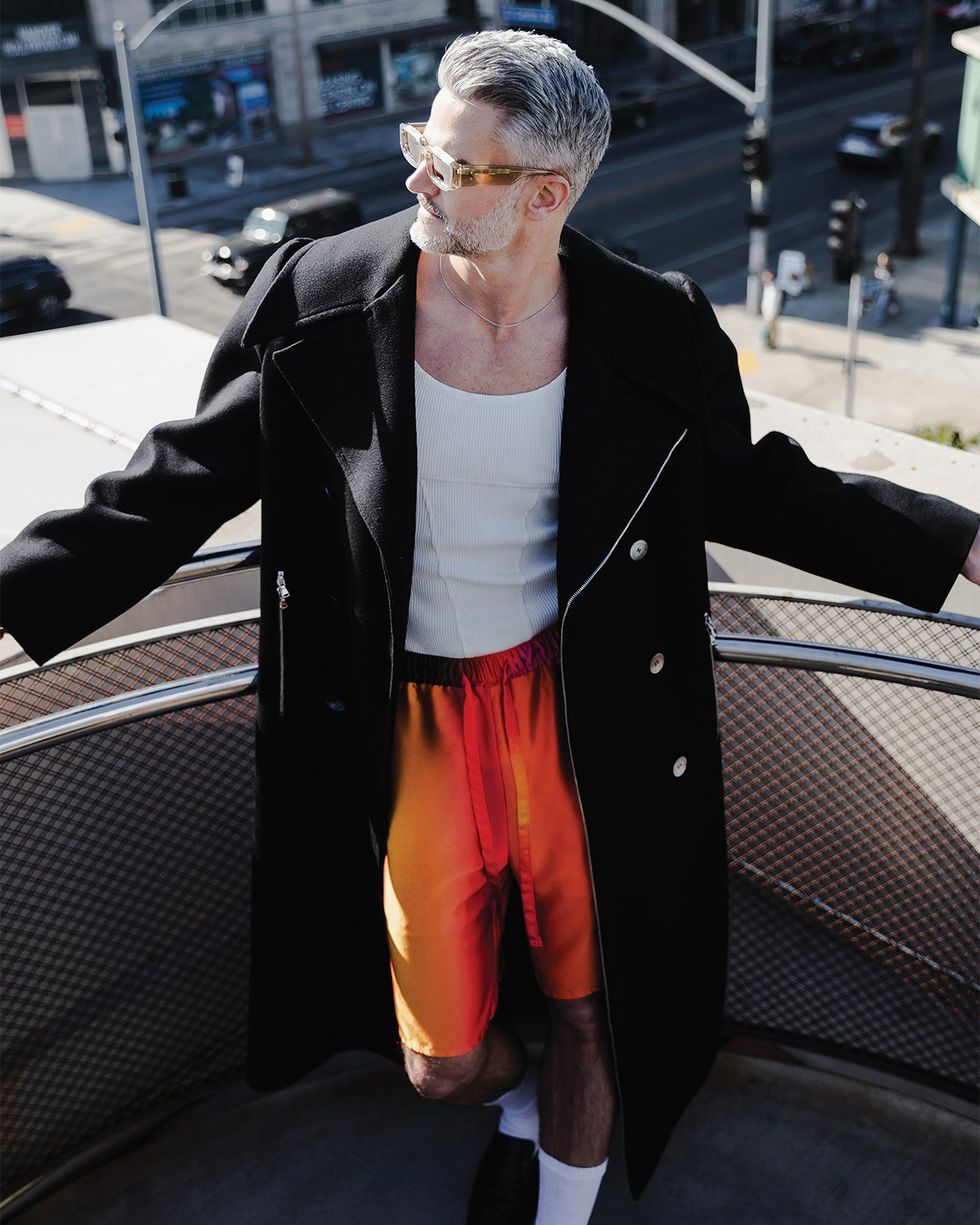 MATTHEW in SONS OF GEMINI Jacket; WEISHENG PARIS Tank; BOY KLOVES Shorts; CLOSED Loafers; JAMES ORO Sunglasses; STERLING FOREVER Necklace and Ring