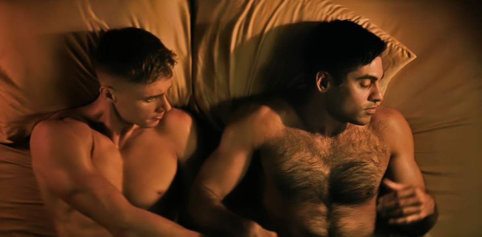 Max Parker as Sgt Sullivan and Sachin Bhatt as Captain Wilkinson together in bed on Boots