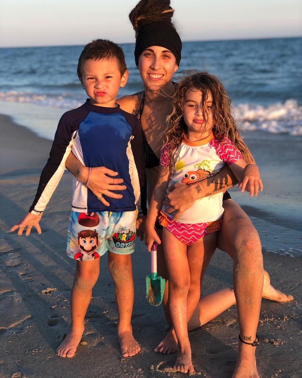 Mel Roy with her children.