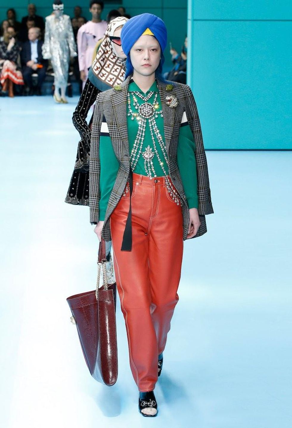 MFW: Gucci Dazzles Us Once Again With Feathers, Severed Heads, & Dragons