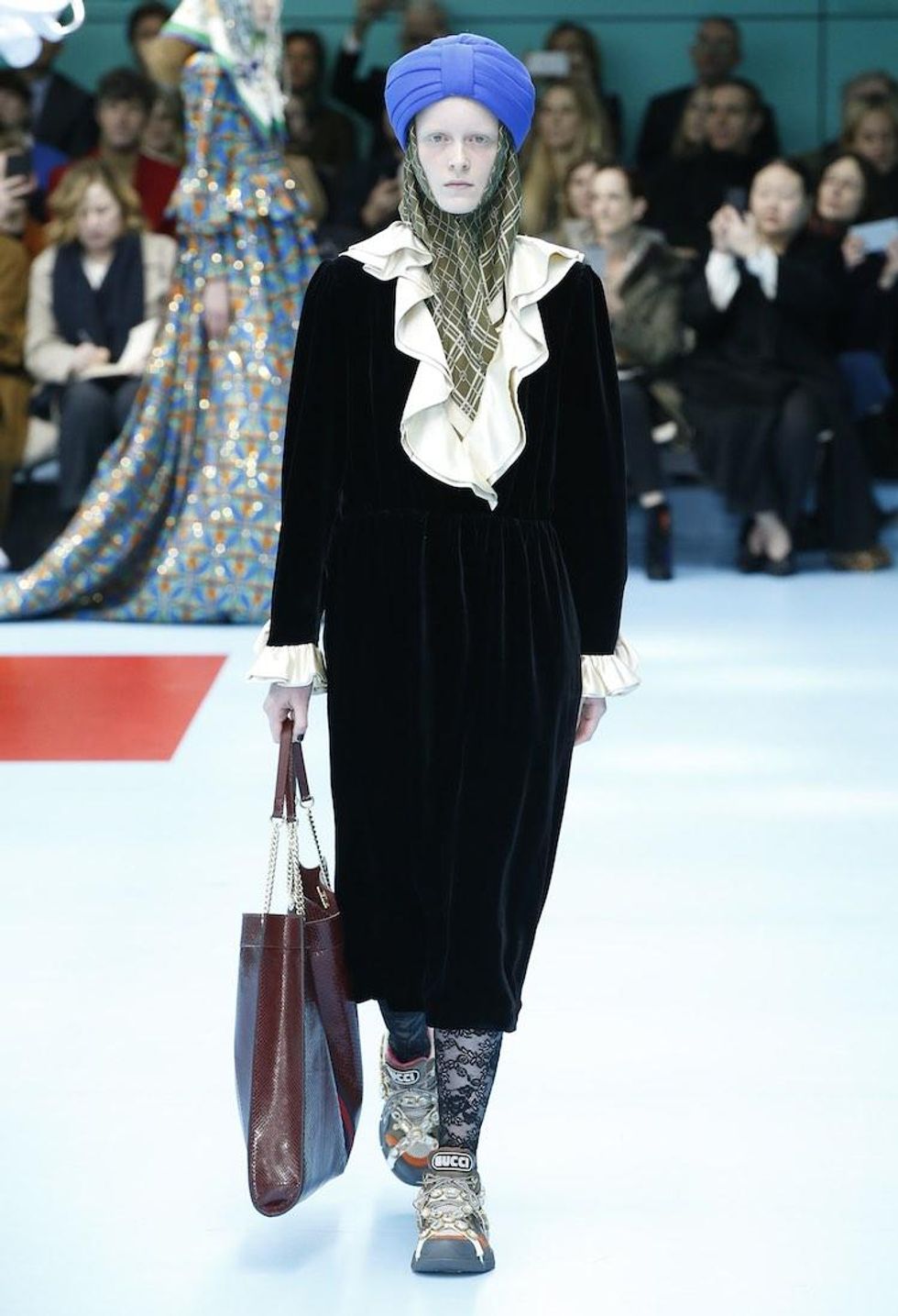 MFW: Gucci Dazzles Us Once Again With Feathers, Severed Heads, & Dragons