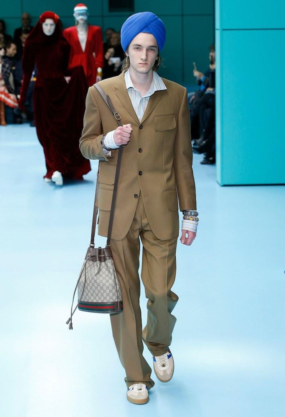 MFW: Gucci Dazzles Us Once Again With Feathers, Severed Heads, & Dragons