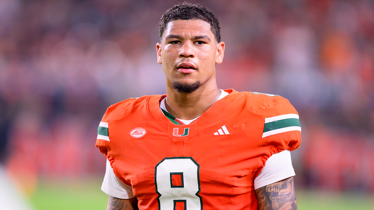 MIAMI GARDENS, FL - SEPTEMBER 27: Miami tight end Elijah Arroyo (8) stands on the sidelines during the college football game between the Virginia Tech Hokies and the University of Miami Hurricanes on September 27, 2024 at the Hard Rock Stadium in Miami Gardens, FL.