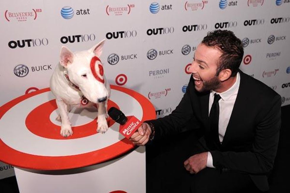 Micha Jesse tries to get a few words with Bullseye the Target dog