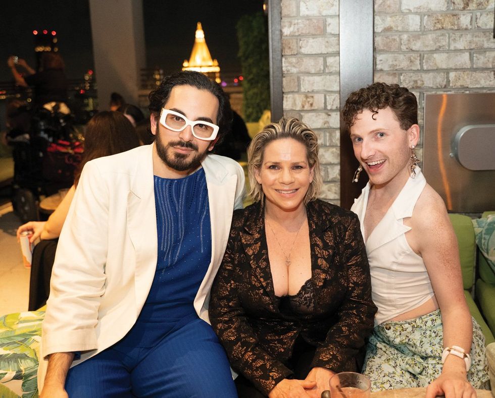 Michael Shayan and Tracy E. Gilchrist and the drag performer Plasma