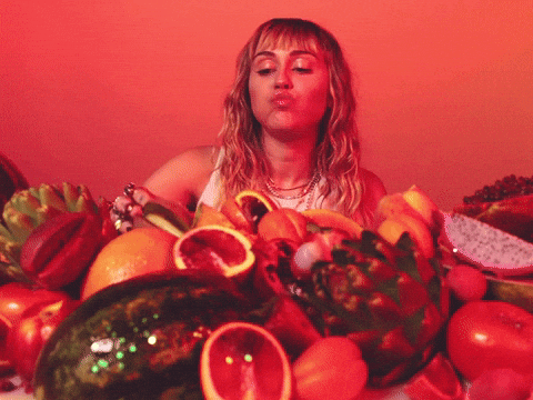 miley eating fruit