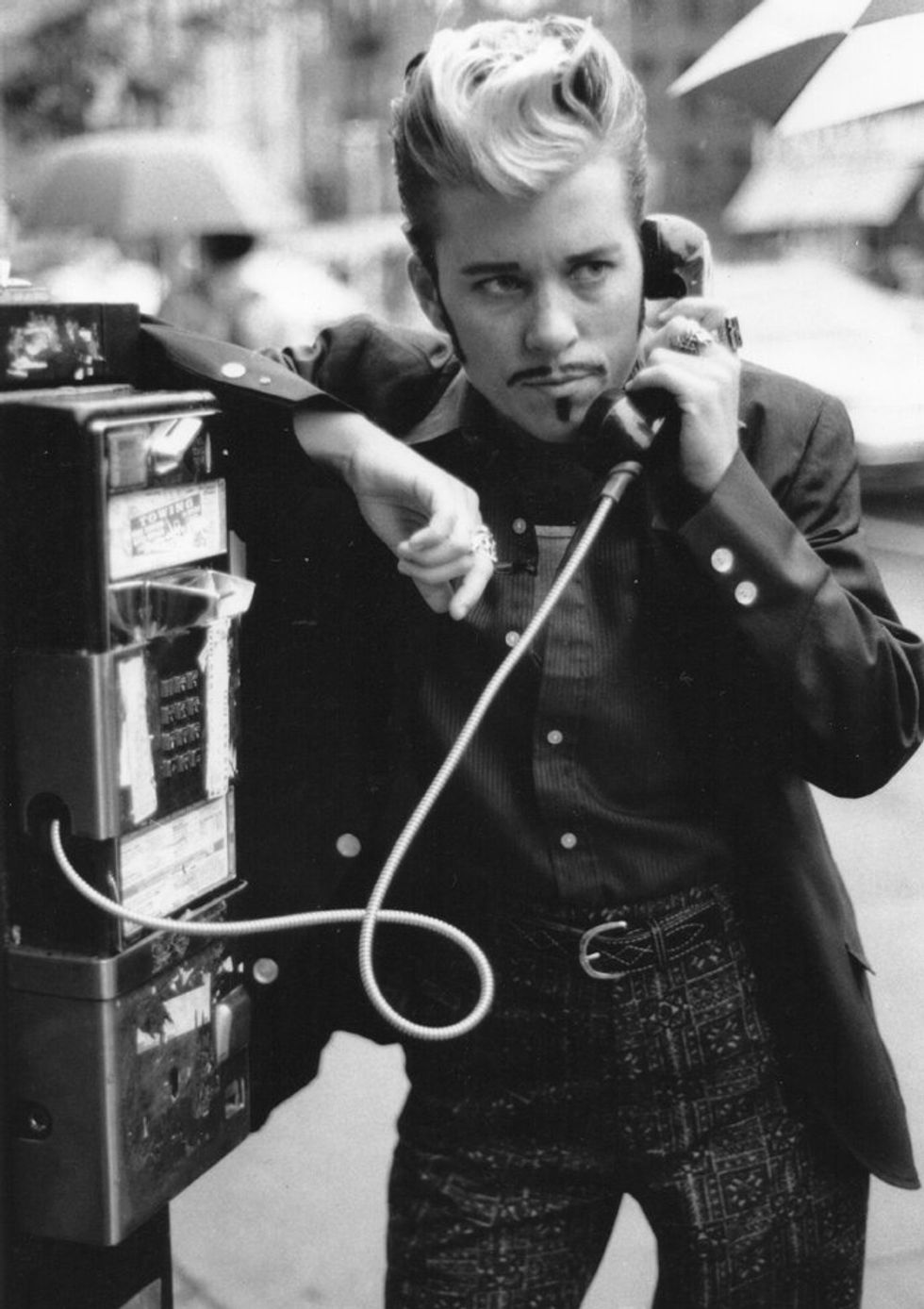 Mo B. Dick in a pay phone