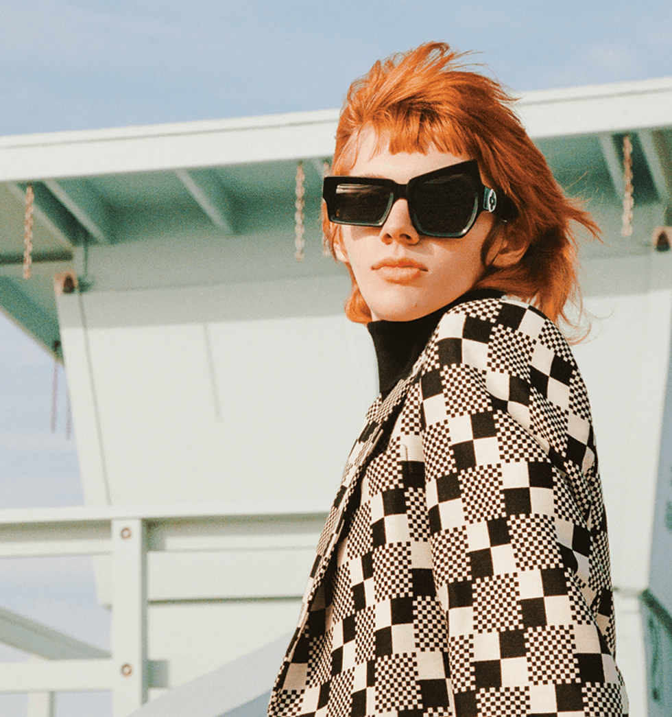 Model Erik Sathrum escapes to the California sun in Louis Vuitton's spring summer 2021 collection.