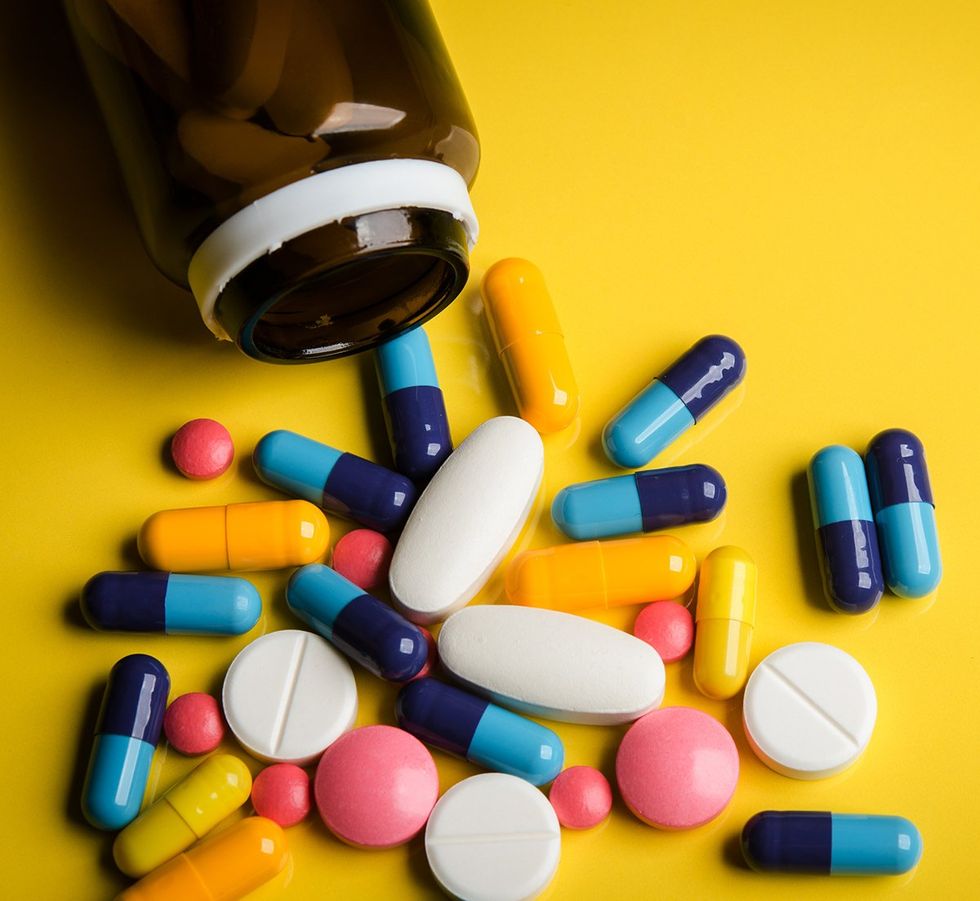Nex Benedict Explainer - colorful pills spill bottle