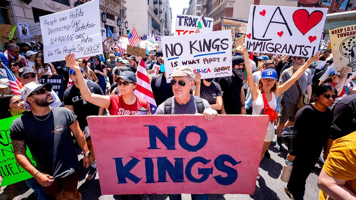 No Kings march protest rally Los Angeles June 2025 LA Loves Immigrants sign