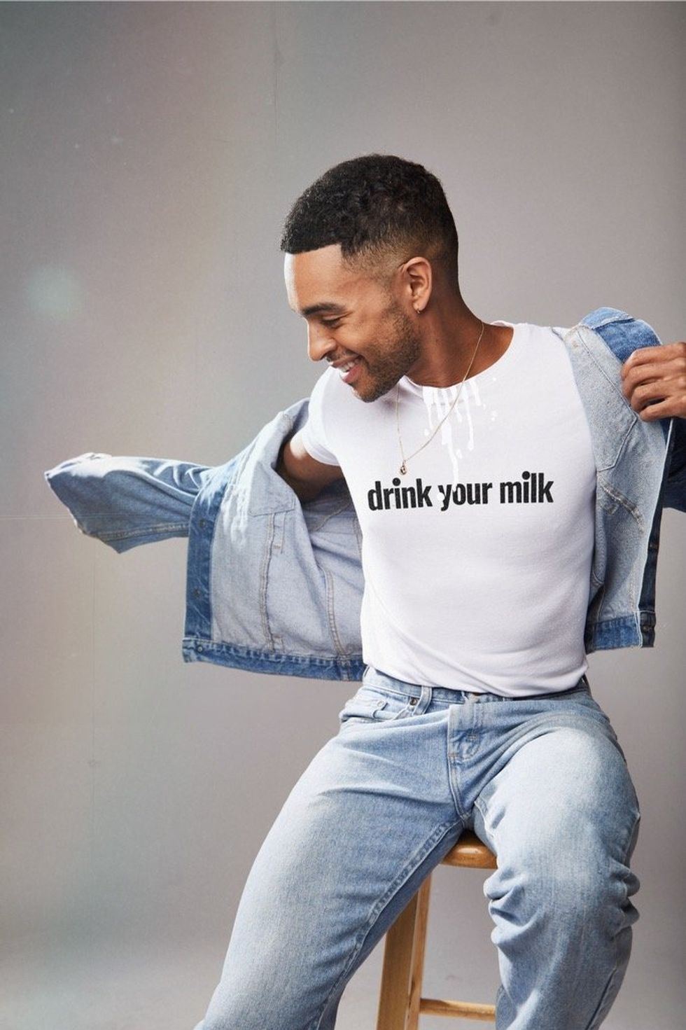 Noah J. Ricketts wears the Loewe "Drink Your Milk" t-shirt to support The Shameless Fund.