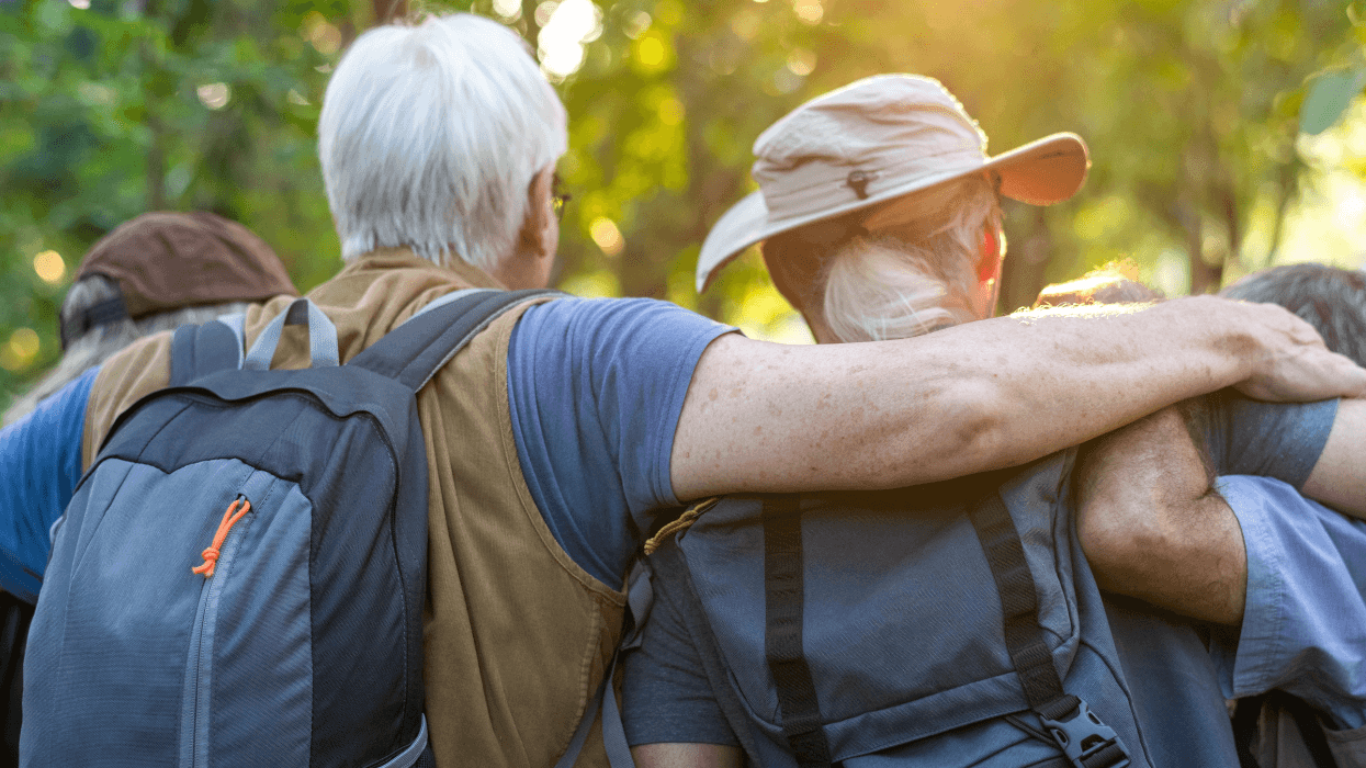 Older adults walk together outdoors