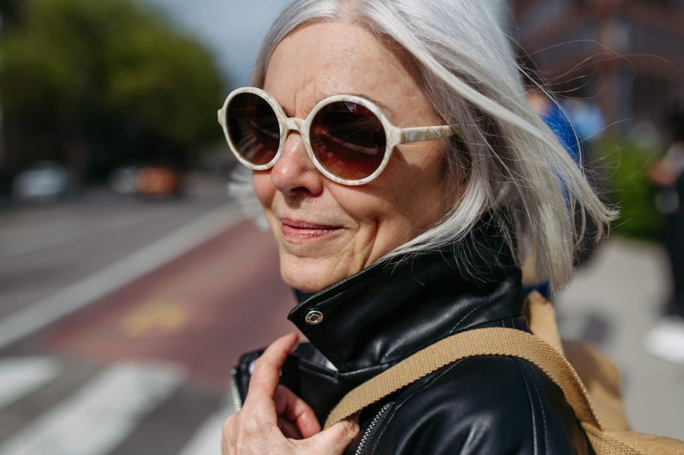 Older femme wearing sunglasses
